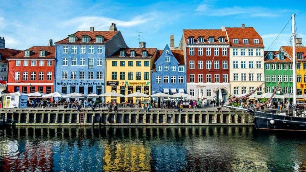 Colorful historic buildings line the Nyhavn canal in Copenhagen