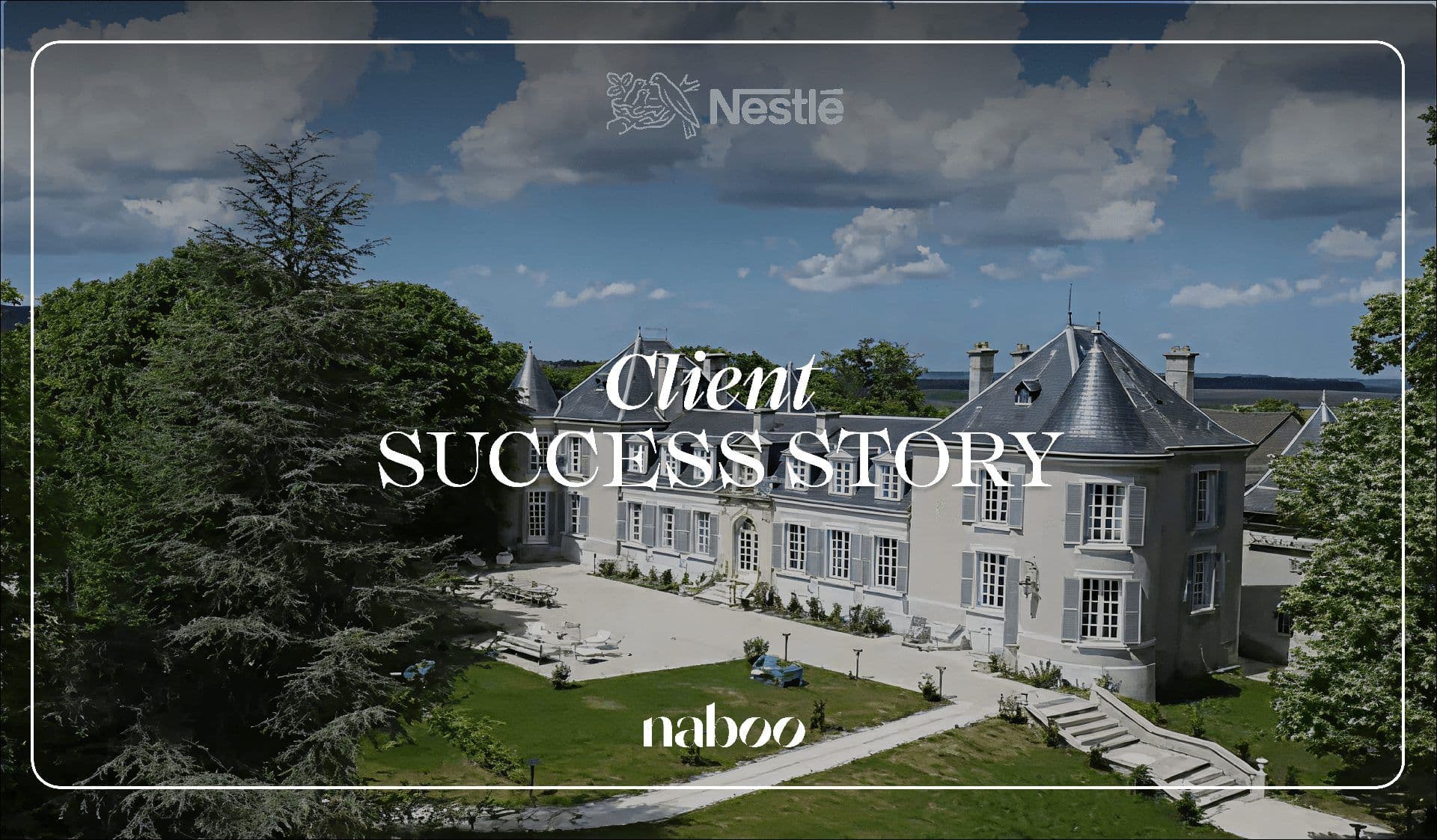 Grand historic chateau venue with grey roofs, green lawns, and outdoor seating