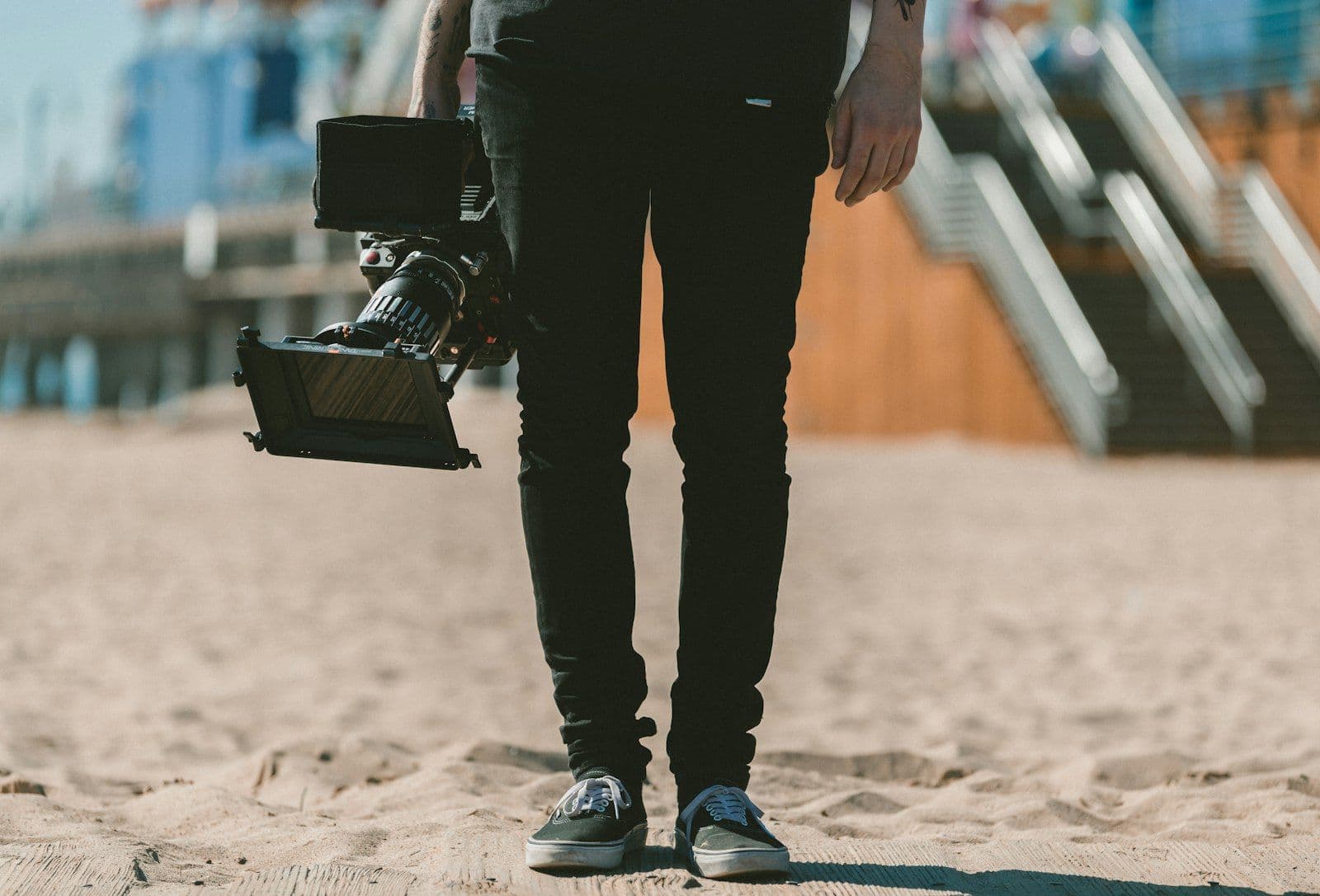Videographer filming with a professional camera