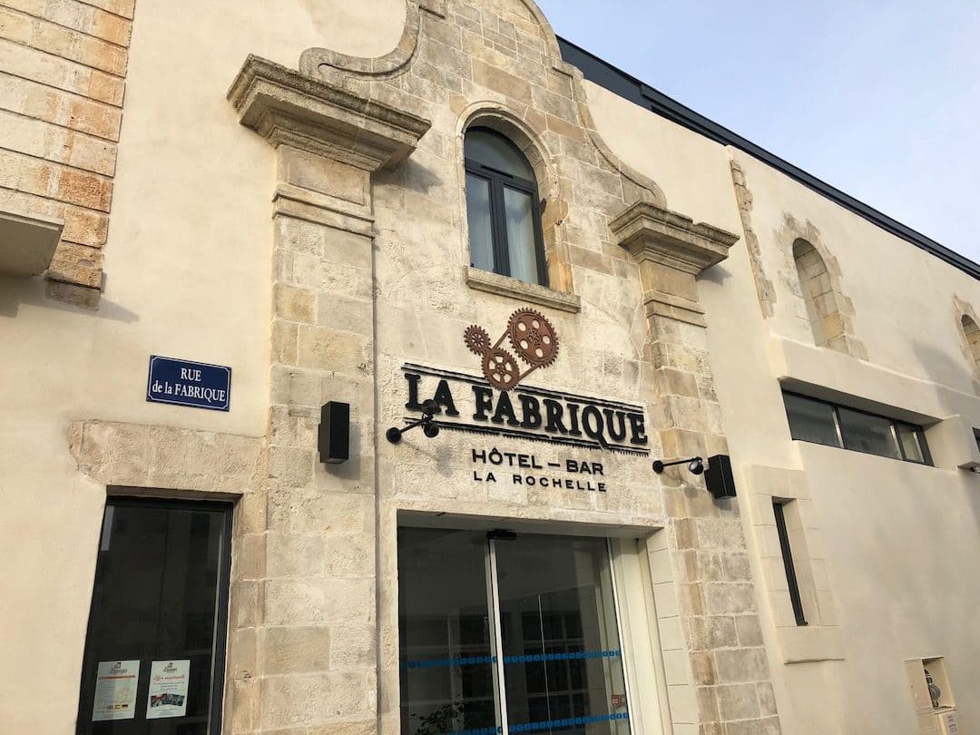 Exterior of La Fabrique Hotel-Bar in La Rochelle, a historic corporate event venue.