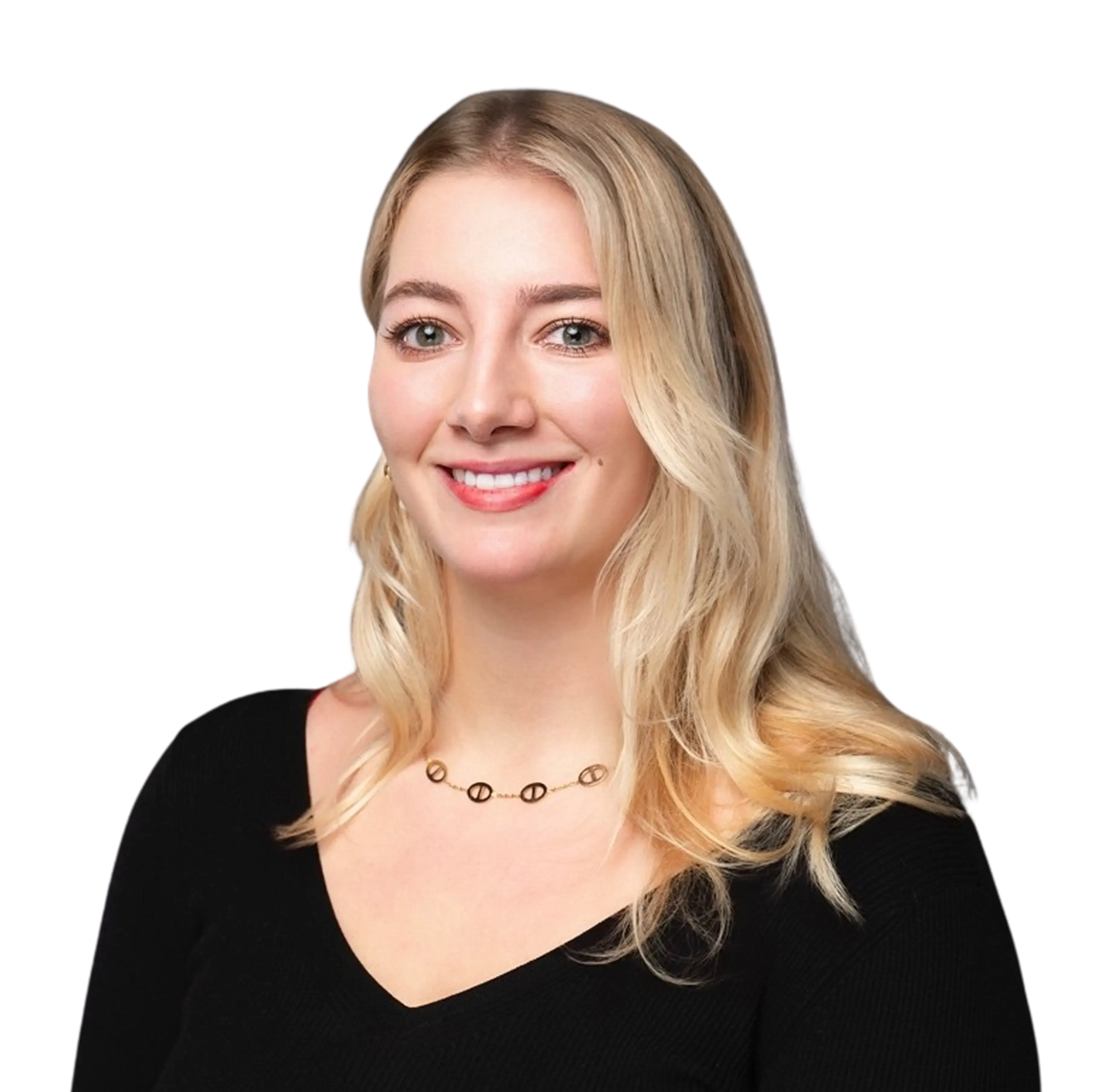 Headshot of a smiling blonde woman with green eyes wearing a black top and a gold necklace.