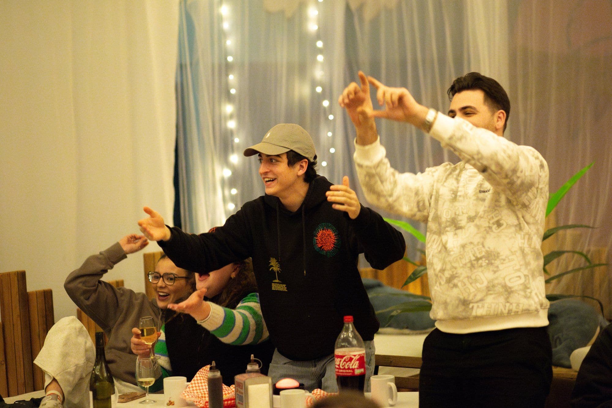 Naboo colleagues miming answers during a team games night with no materials needed
