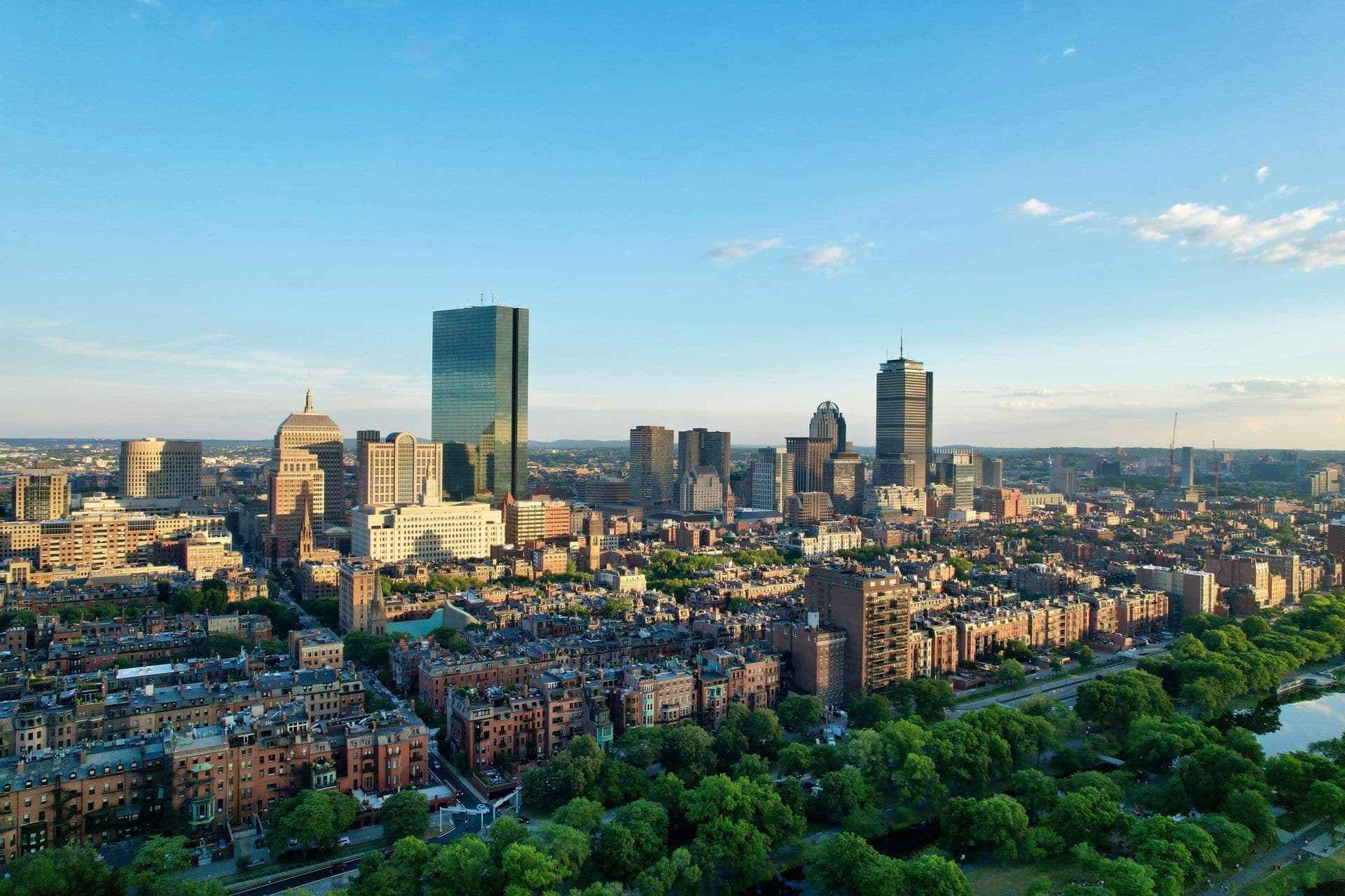 Panoramic aerial view of Boston, Massachusetts, showcasing its iconic skyline with diverse corporate event