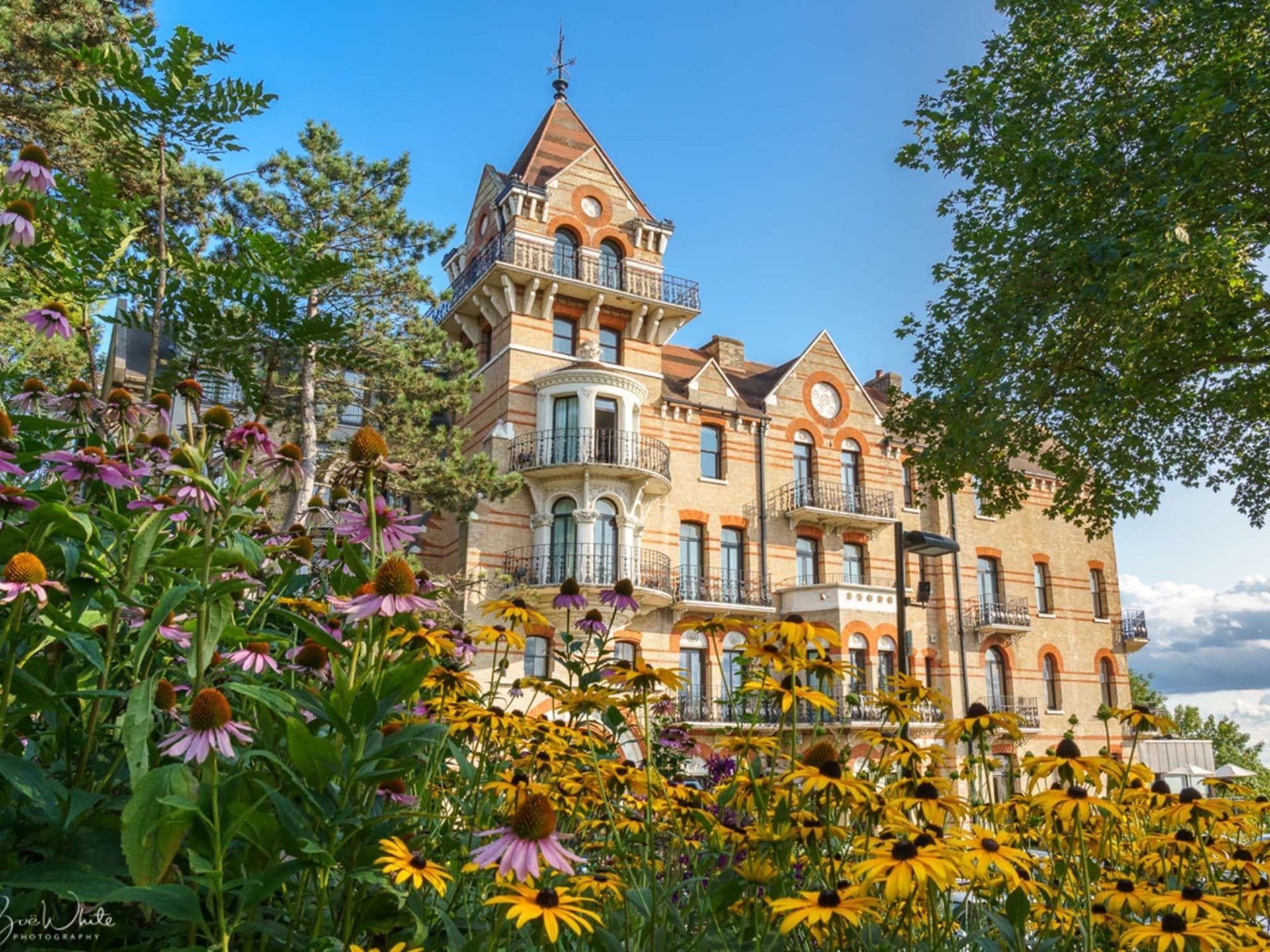 A grand historic corporate event venue with a distinctive tower