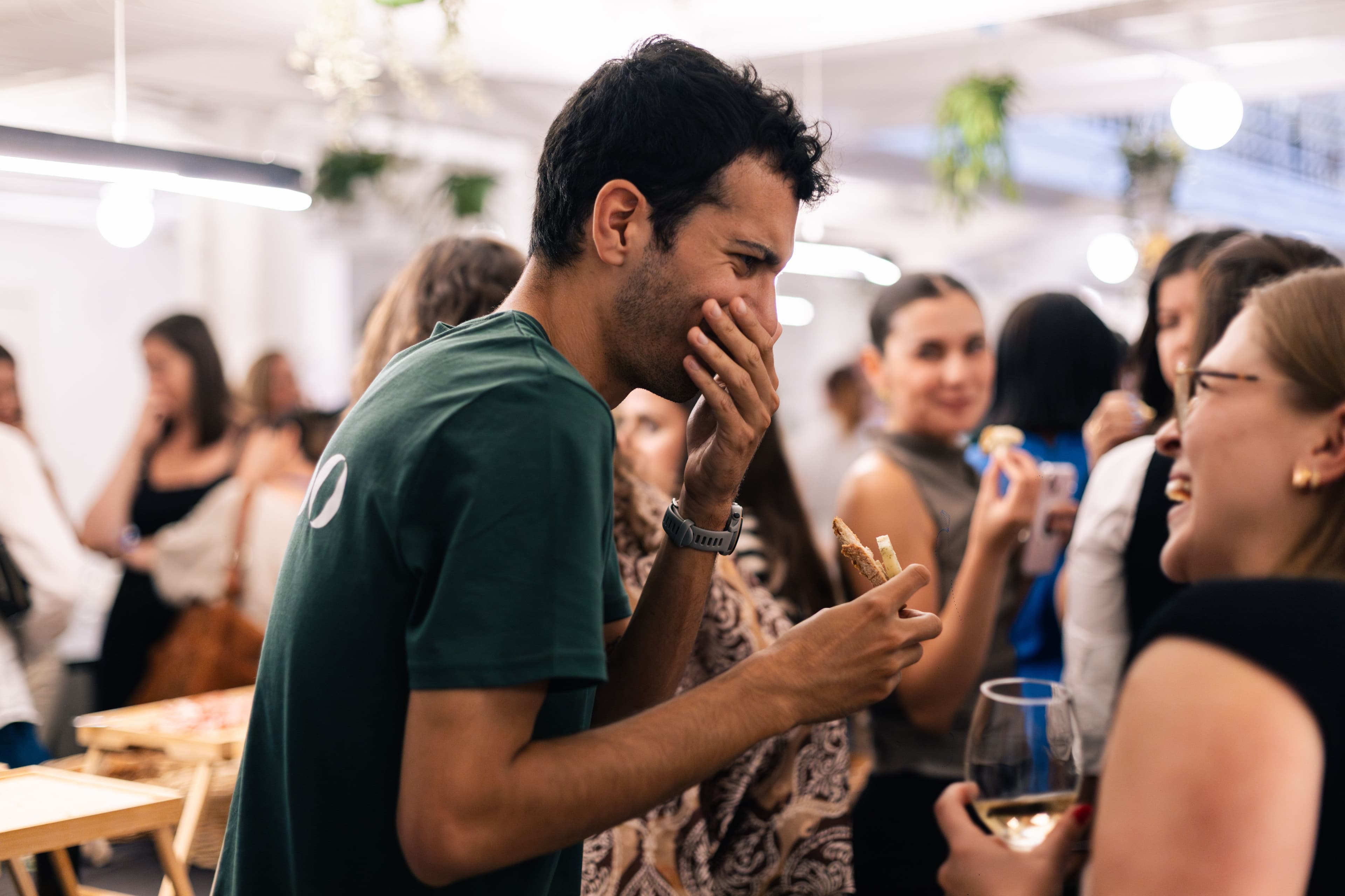 A man laughing at the best ice breaker.