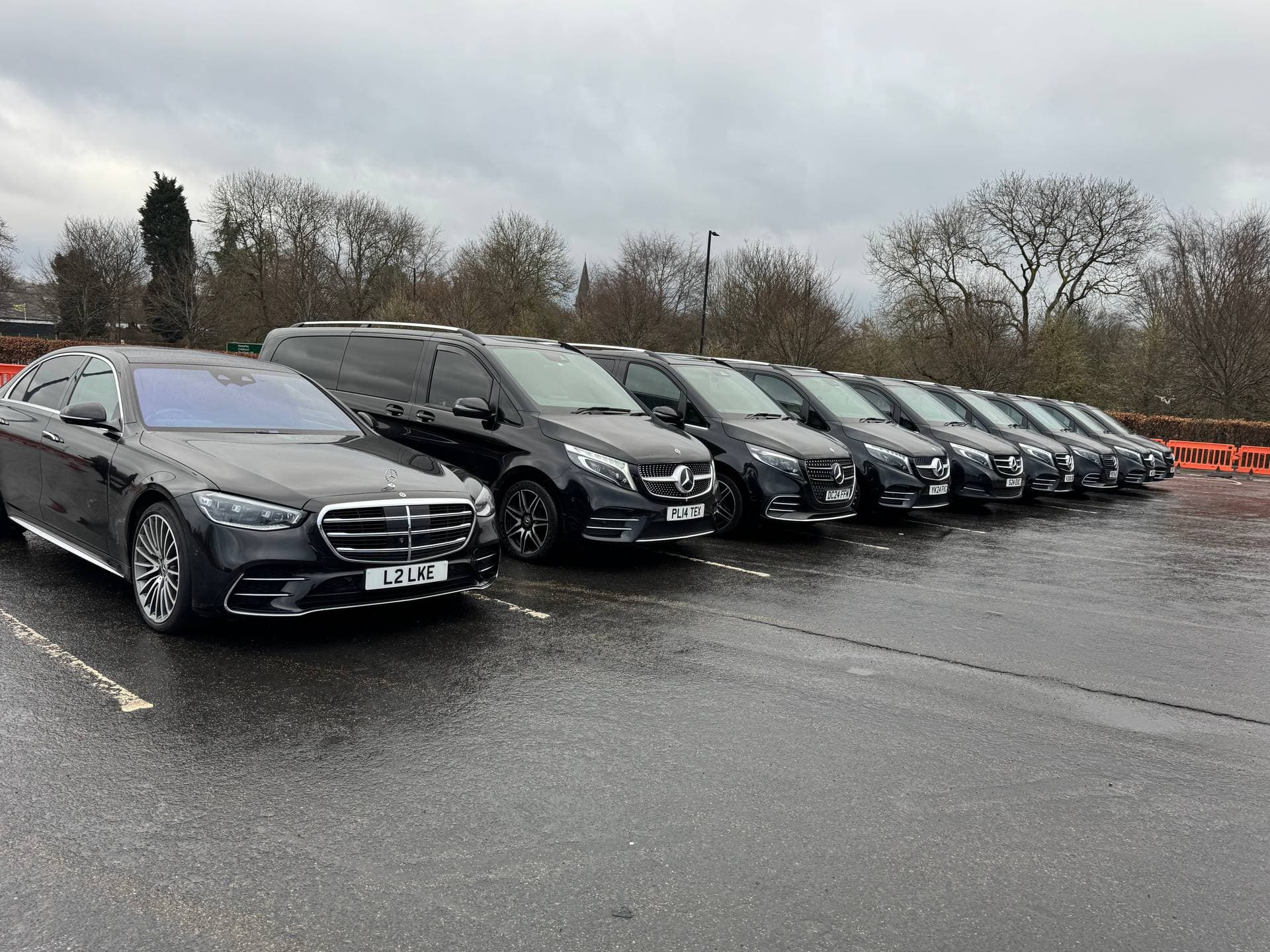 Modern Mercedes-Benz fleet maintained to corporate travel standards.