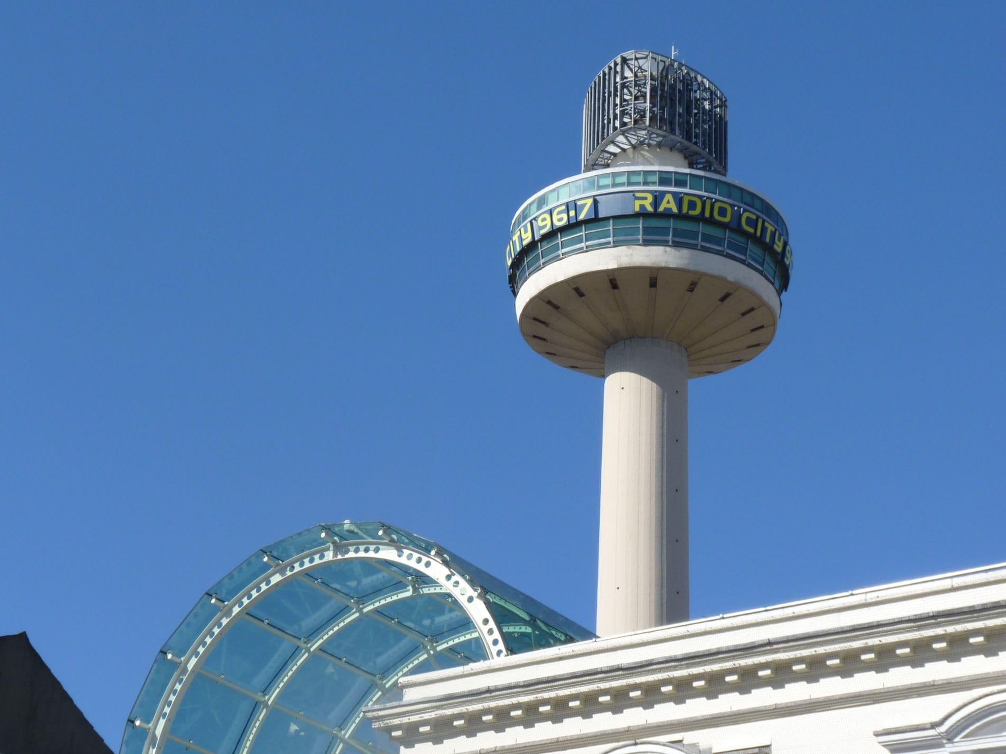 The Radio City Tower, a unique corporate event venue, stands tall under a clear blue sky in Liverpool, UK.