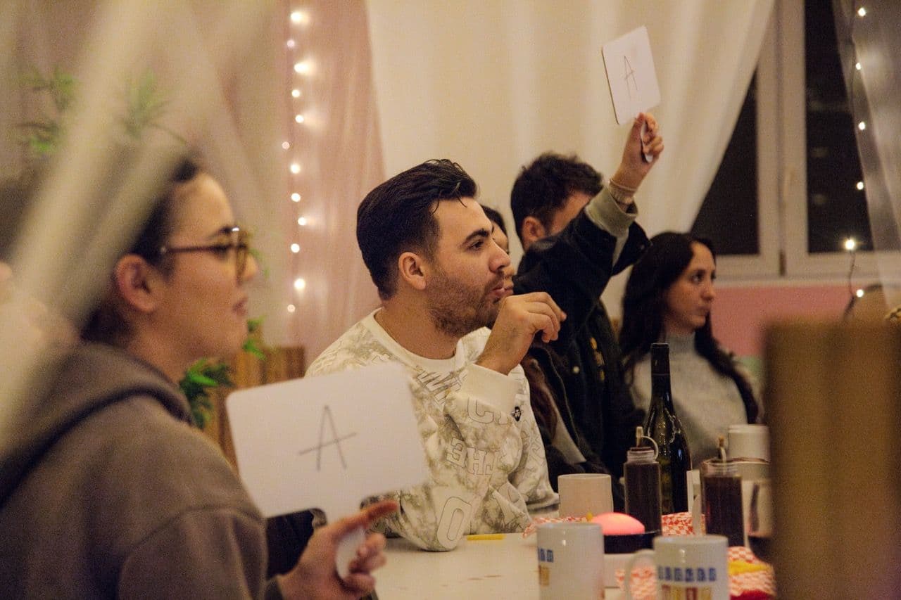 Attendees participate in an interactive team building workshop