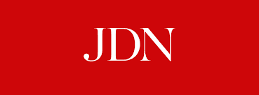 White serif letters 'JDN' displayed prominently on a solid, vibrant red background.