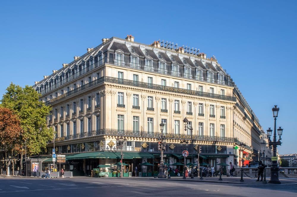 The historic Le Grand Hotel in Paris, a grand corporate event venue with outdoor dining.