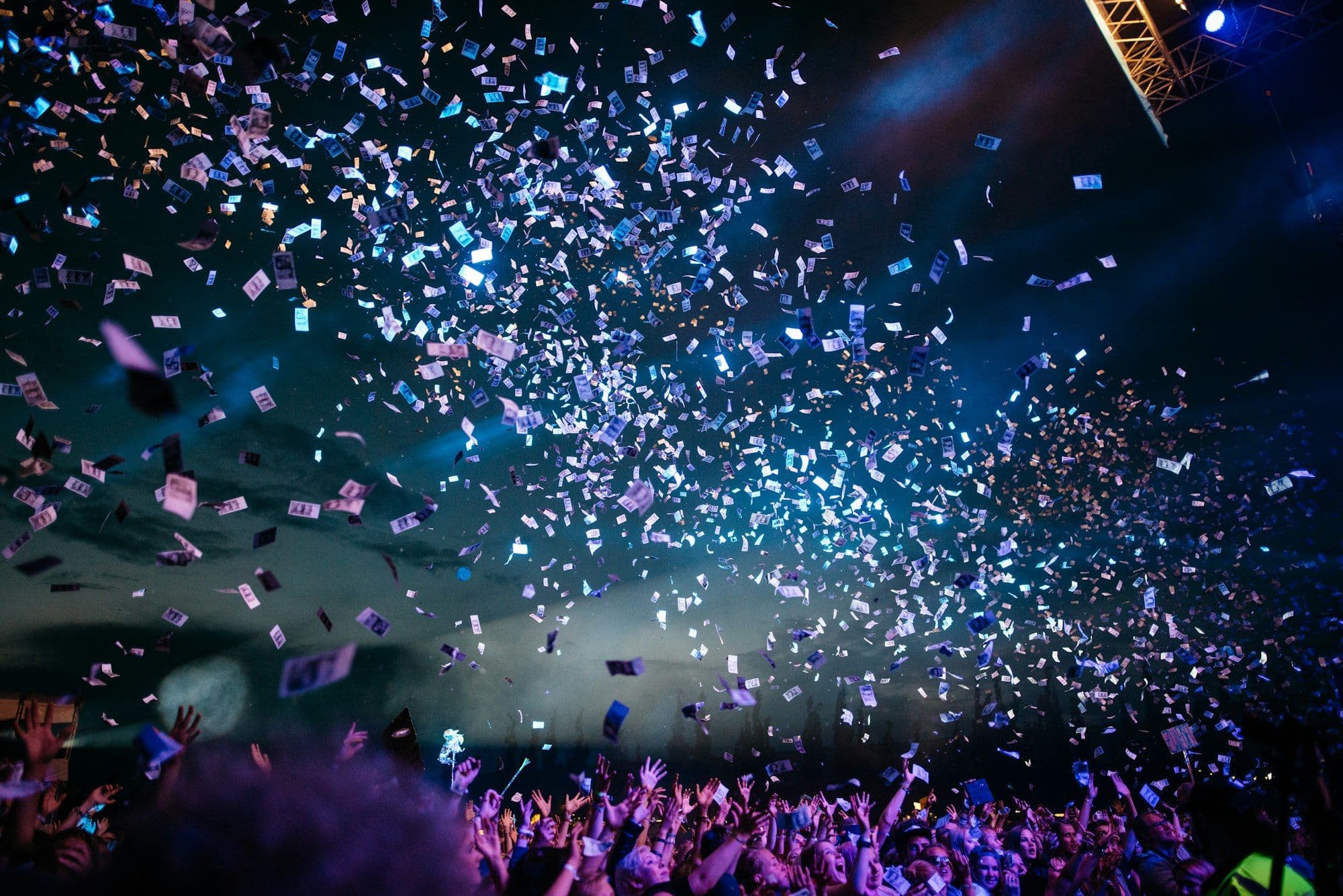 Colleagues celebrating with confetti at a New Year's Eve company party