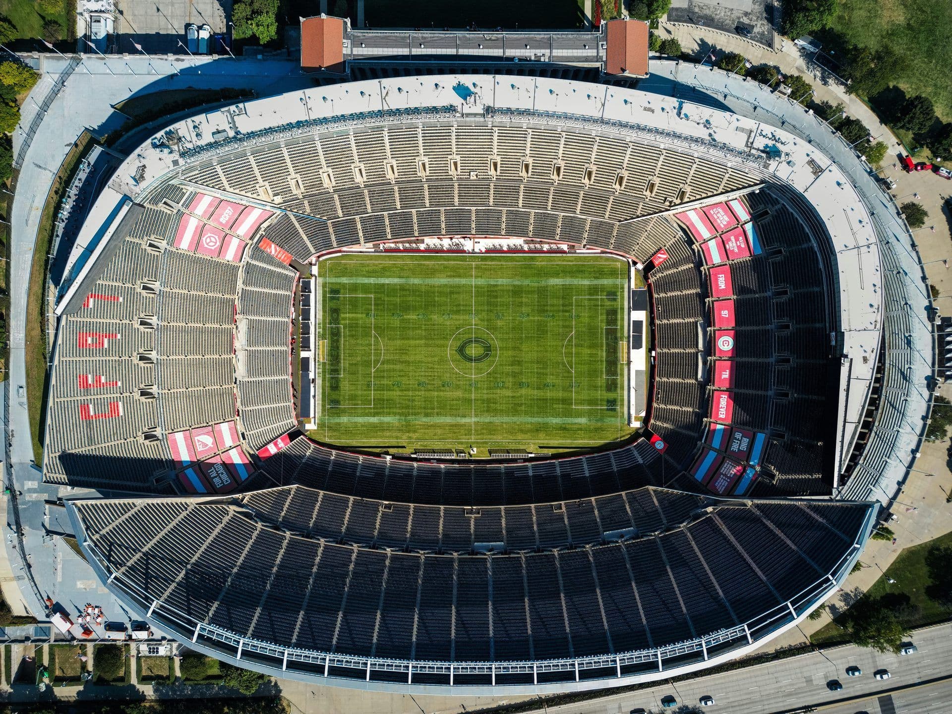 Overhead view of Soldier Field, a large corporate event venue in Chicago with a football field and empty